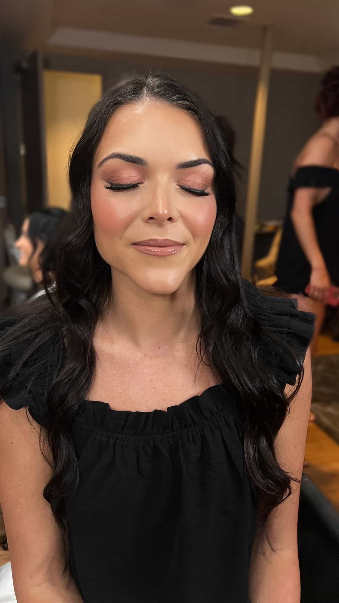 Same bride after bridal makeup and hair preview