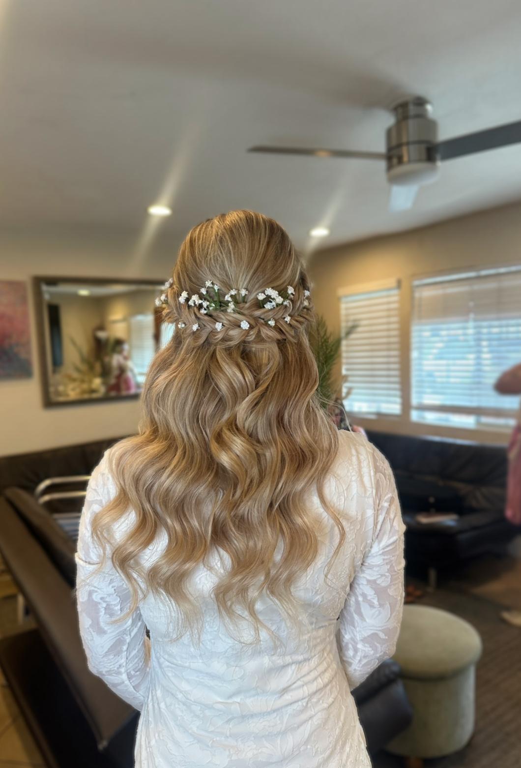 Radiant bride with elegant veil after bridal makeup application