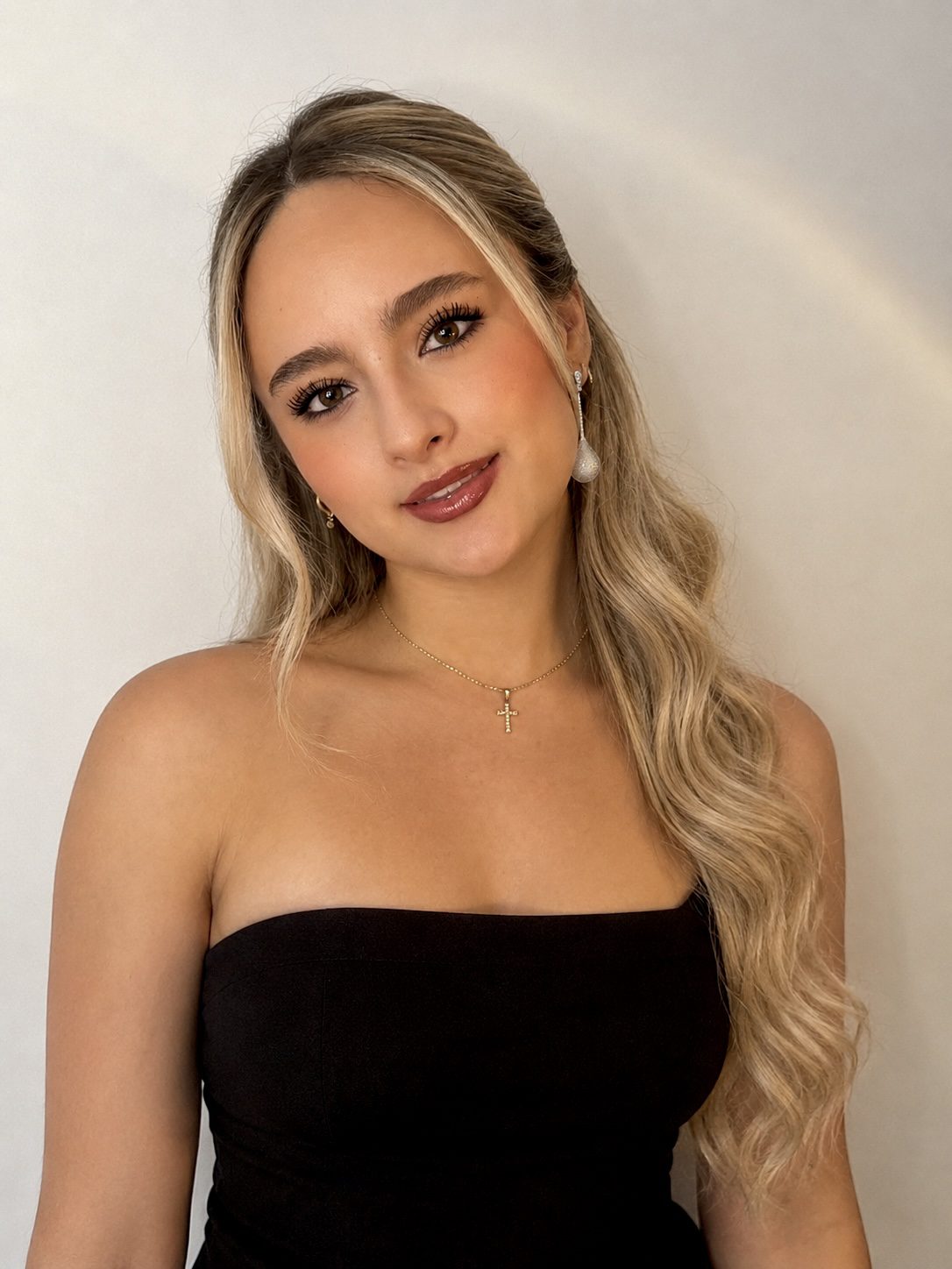 Fresh homecoming makeup look with soft glam details